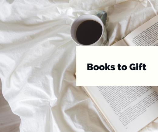 books to gift book on white bedspread